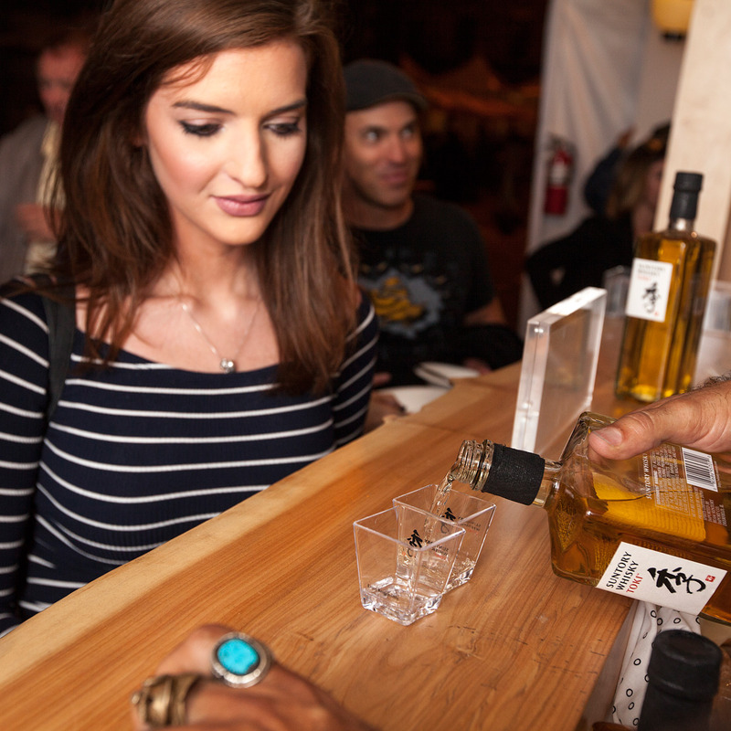 A Southside bartender serving whiskey to a guest.