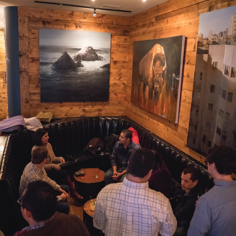 Friends gathered around a table in Southside’s warm wood lounge.