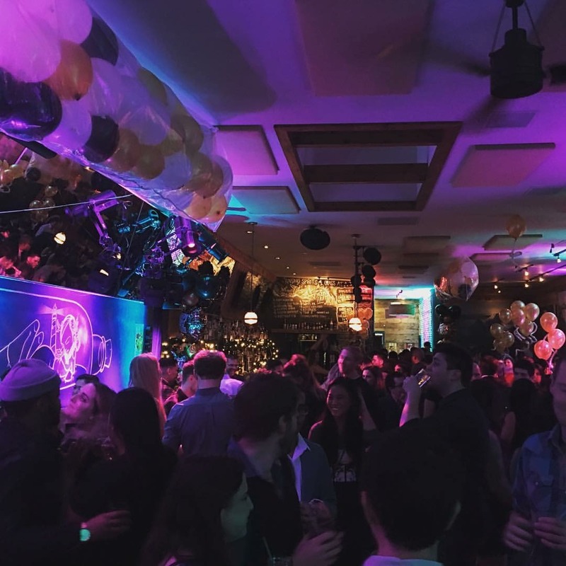 Guests, colored lighting and balloons during an evening at Southside.