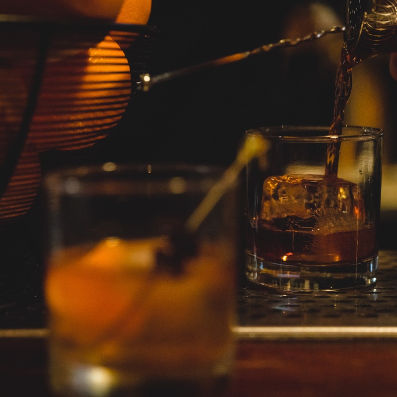 Whiskey poured over a large ice cube at Southside Spirit House.